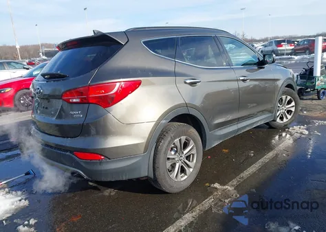 2014 Hyundai Santa Fe Sport 2.4L z USA, uszkodzony, nr VIN 5XYZUDLB5EG136383